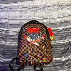 Davidoff Checkered Backpack with Red and Blue Accents